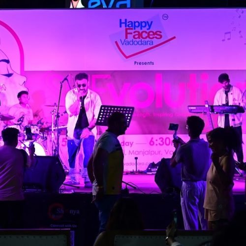 Band performing live on stage at SheVolution